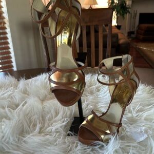 Michael Kors heeled sandals in beige and gold. Size 8 Leather with back zipper.